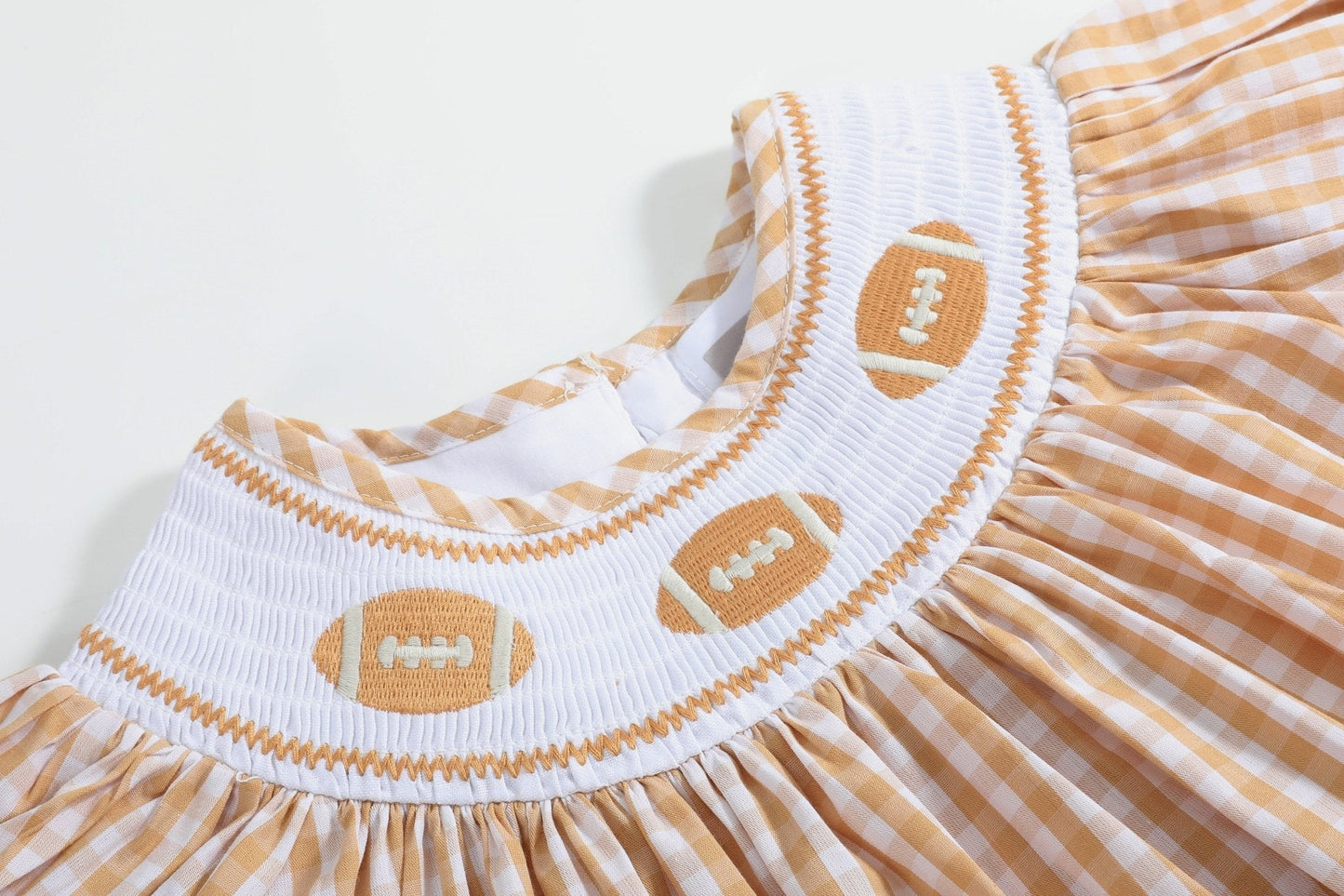 Brown Gingham Football Smocked Bishop Dress