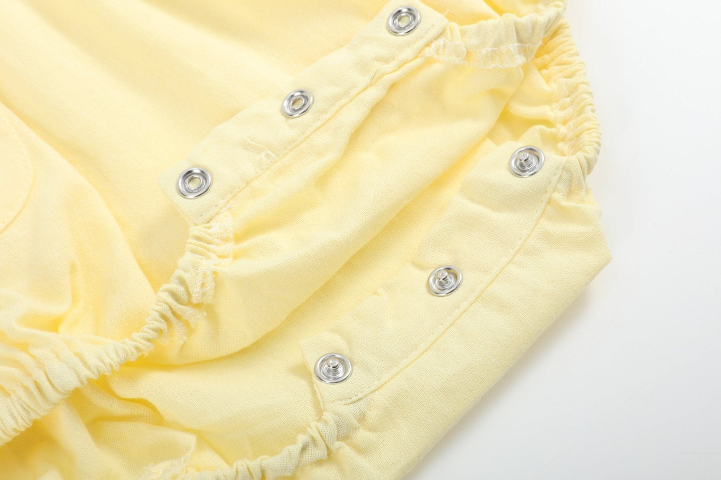 Yellow Daisy Pocketed Smocked Flutter Romper
